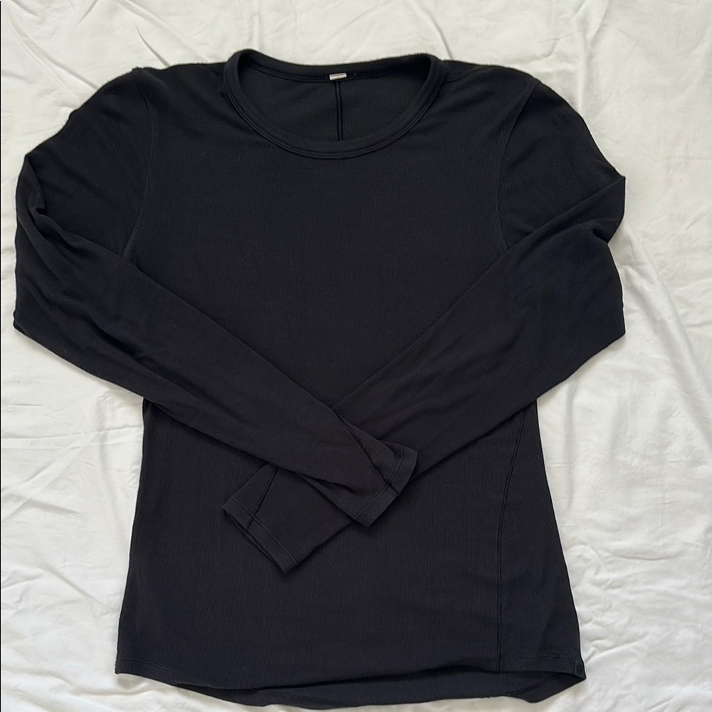 Lululemon Black Ribbed Long Sleeve Top. Good used condition, tag removed. Size 8